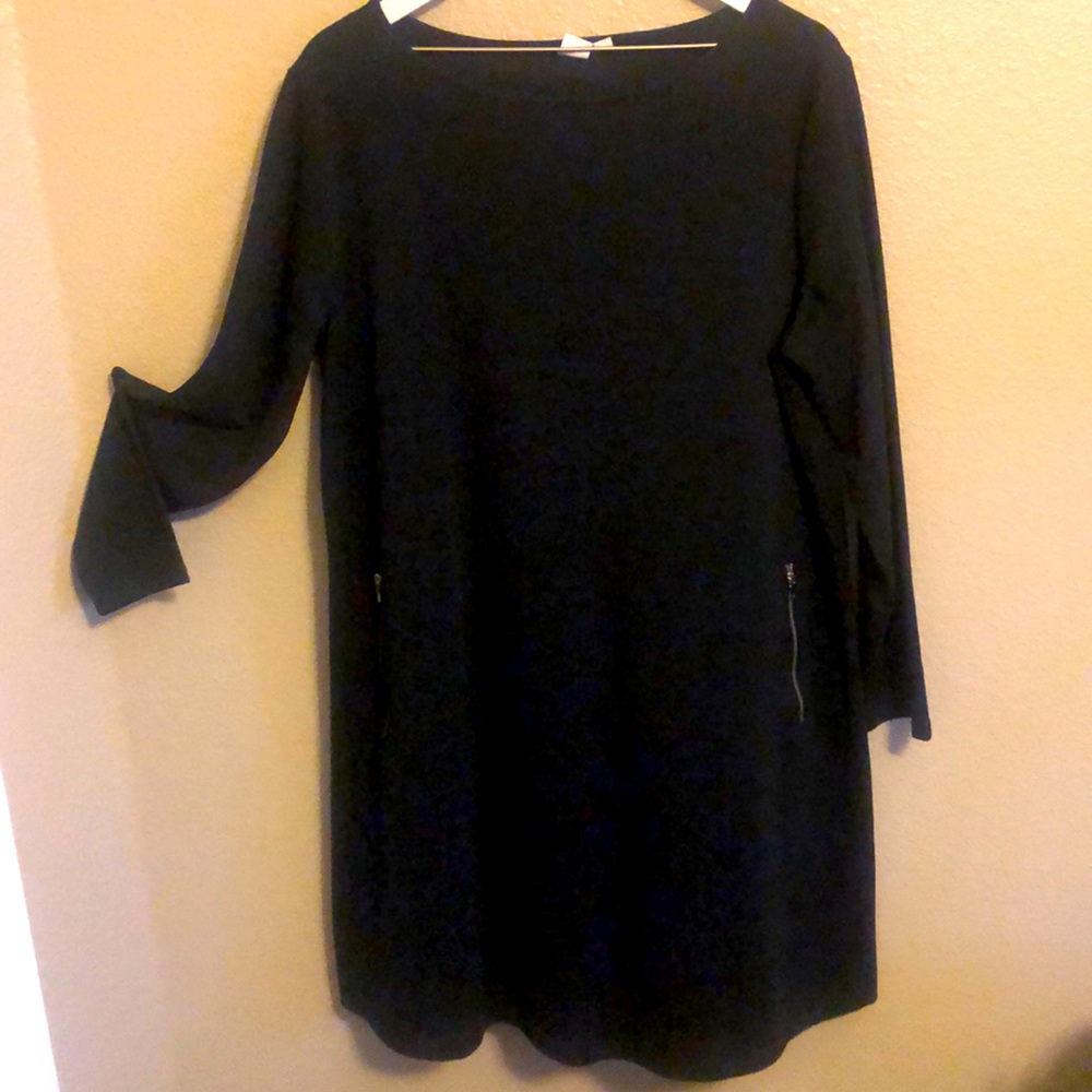 Swing dress with faux zippered pocket accent